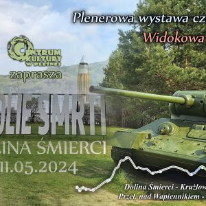 Duży napis "Dolina Śmierci". W tle po prawej stronie czołg, po lewej górski krajobraz.
