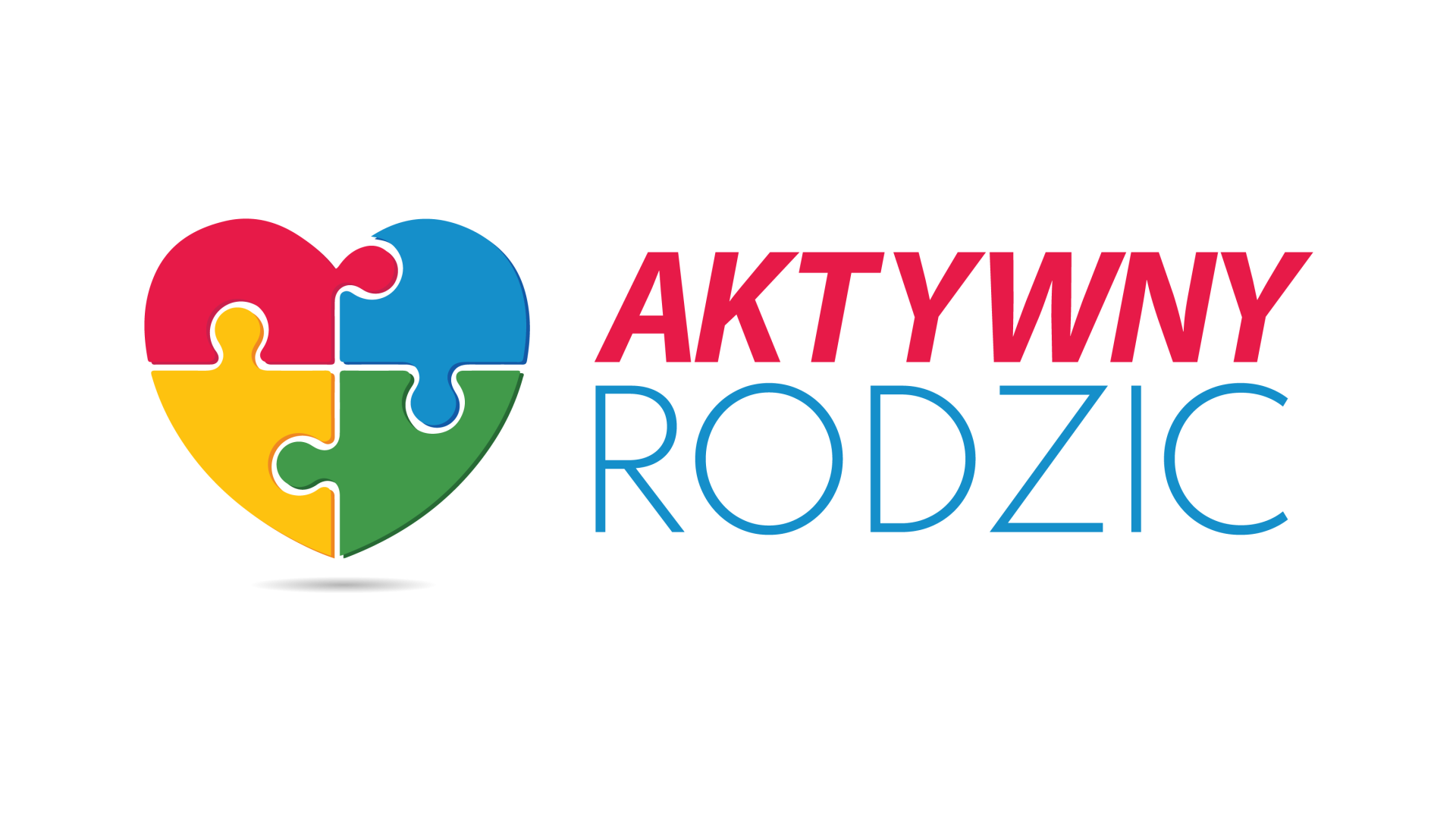 Logo programu Aktywny Rodzic, serce złożone z czterech puzzli w kolorach czerwonym, niebieskim, zielonym i żółtym.