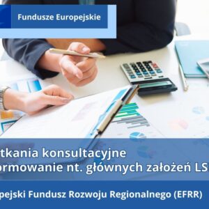 Na biurku wydruki z wykresami, kalkulator, smartfon, mężczyzna trzyma długopis, kobieta trzyma kartkę z wykresem