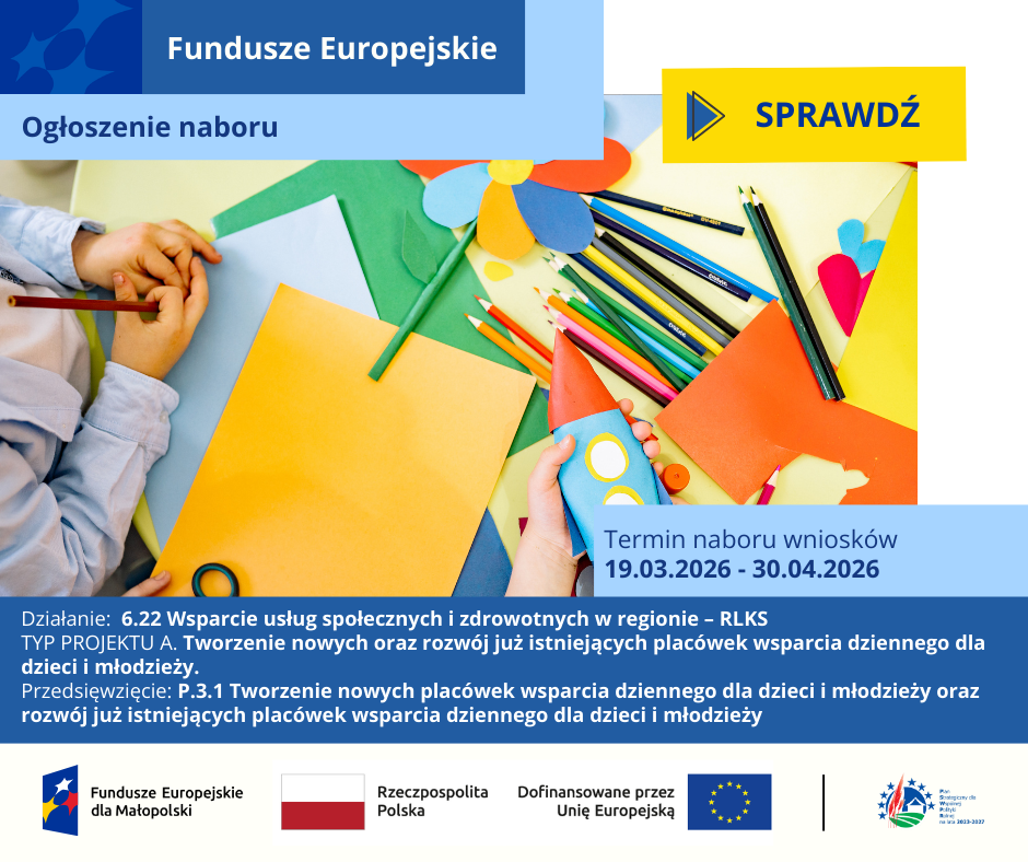 Na stoliku porozkładane kredki i papier kolorowy